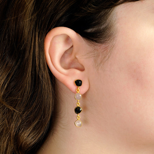 longues boucles d'oreilles en pierre noire et blanche